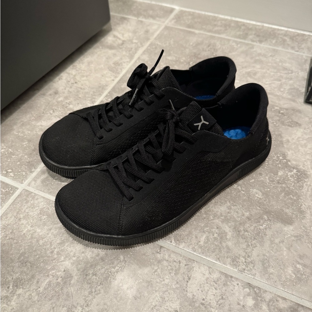 Stealth black flux footwear trainers